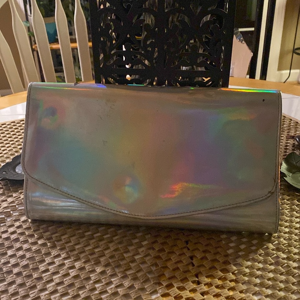 Clutch in silver irridecent color